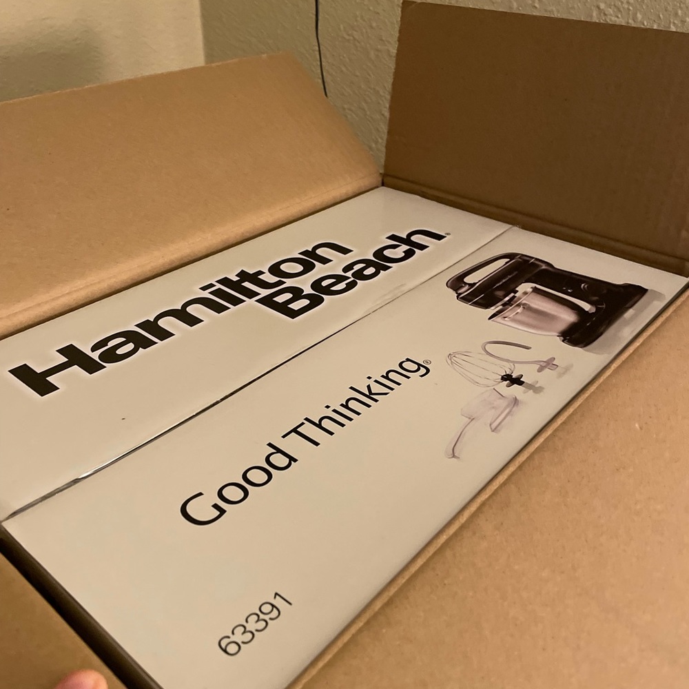 In the box, never opened Hamilton beach mixer.